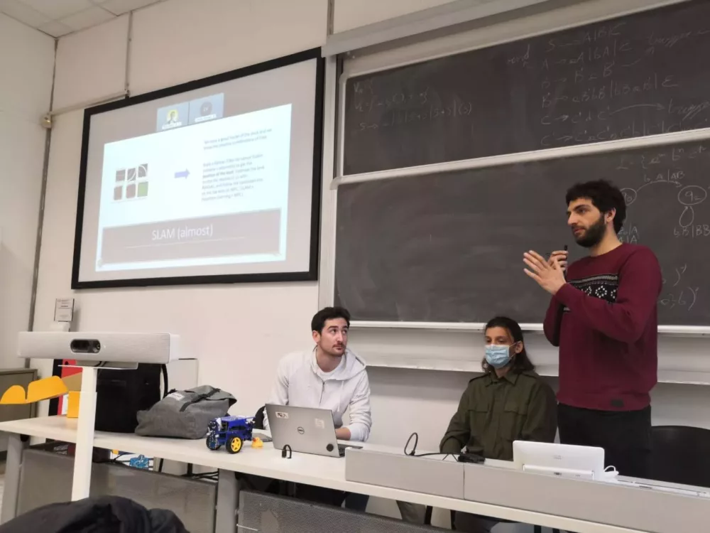 Giulio Vaccari and colleagues presenting Duckietown at the Polytechnic of Milan
